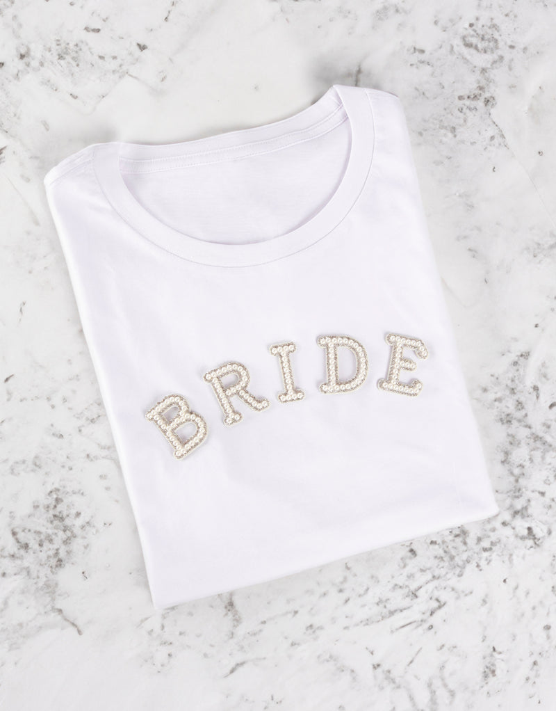 BRIDE iron-on patch on white Tshirt