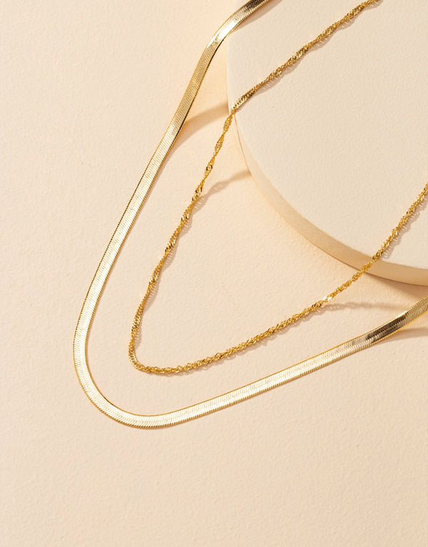 Set of 2 layered charm necklaces, Polished zinc alloy material, Delicate pendant design.