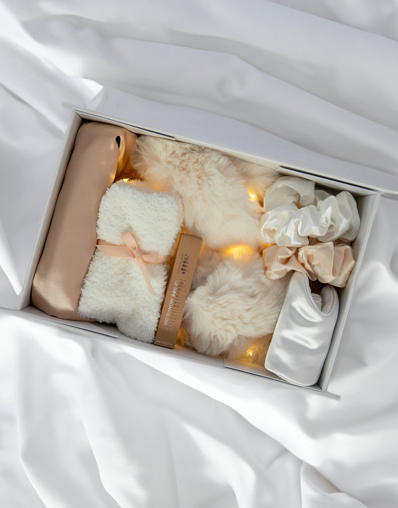 Champagne Satin Dreams Gift Box | Curated Gift Box: Luxe Satin Camisole Set in Champagne (optional personalisation); Ivory Sleep eye mask (optional personalisation); Ivory Fluffy slippers; Pair of ivory fluffy socks; 2 Silky scrunchies; Argan vegan lipstain; Gift box (optional personalisation) with Fairy Lights..