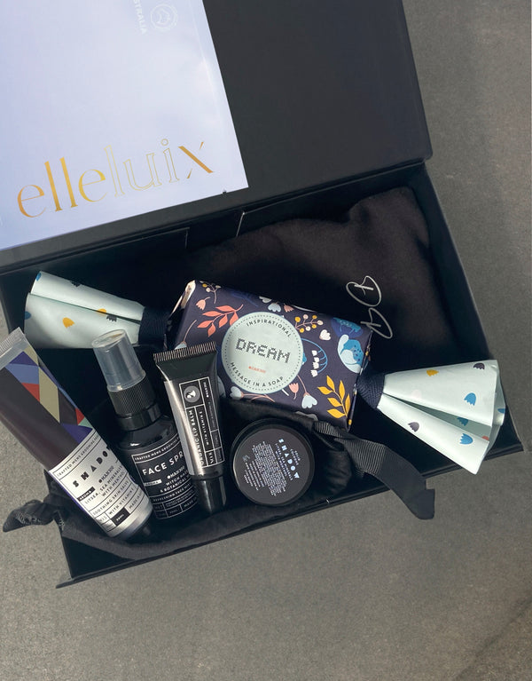23dreams Pamper Him Gift Box | Curated Gift Box. Includes a Premium Cotton Tshirt (personalisation available); Message in a Soap Dream Bonbon; Intense hydration mask; Jetset Gift Pack soothing skin salve with Litsea, sea minerals & Aloe with Menthol 30ml; organic lip balm 12ml; face spritz with Witch Hazel & Botanicals 30ml; solid cologne concentrated formula 10ml; travel pouch black drawstring bag and Gift Box