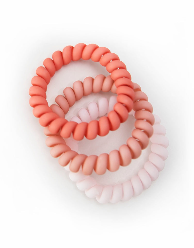 Three hair coils in vibrant fairy floss colors. The hair coils are spiral telephone cord-style hair ties, providing a secure hold without causing damage or kinks to the hair. The coils are 5.5cm in outside diameter.