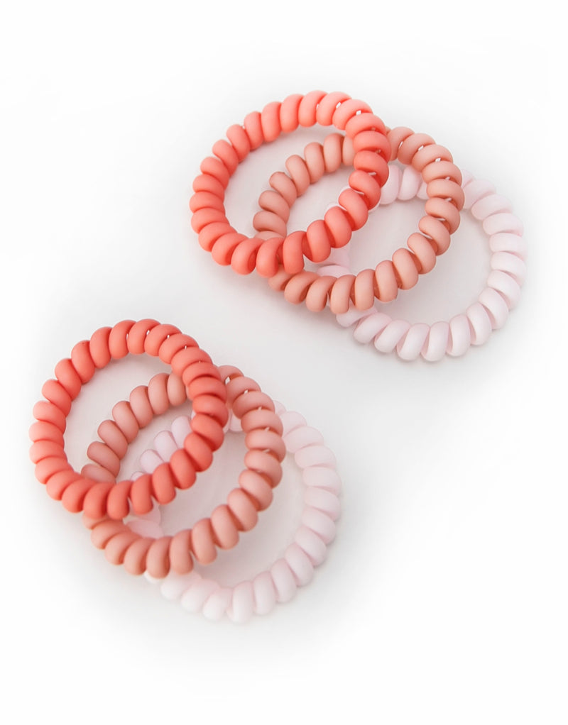 2 packs of 3 hair coils in vibrant fairy floss colors. The hair coils are spiral telephone cord-style hair ties, providing a secure hold without causing damage or kinks to the hair. The coils are 5.5cm in outside diameter.