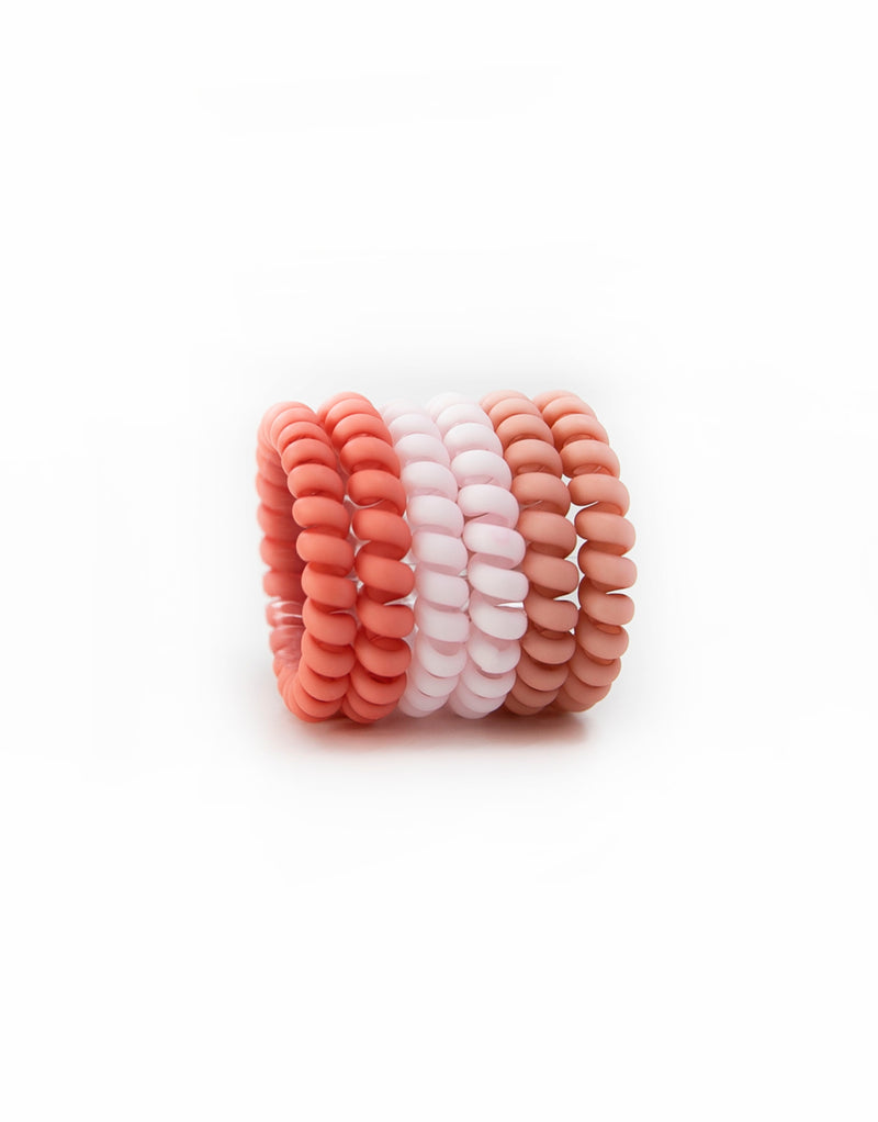 Six hair coils in vibrant fairy floss colors. The hair coils are spiral telephone cord-style hair ties, providing a secure hold without causing damage or kinks to the hair. The coils are 5.5cm in outside diameter.