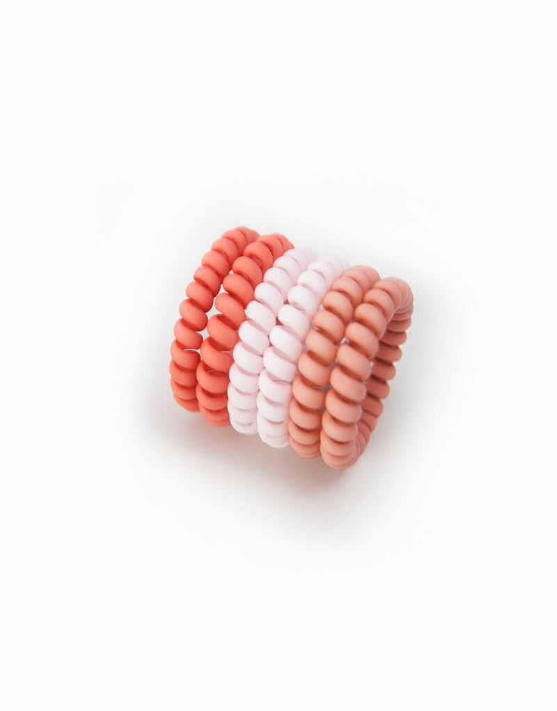 Six hair coils in vibrant fairy floss colors. The hair coils are spiral telephone cord-style hair ties, providing a secure hold without causing damage or kinks to the hair. The coils are 5.5cm in outside diameter.