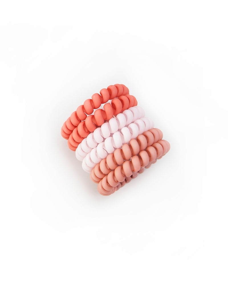 Six hair coils in vibrant fairy floss colors. The hair coils are spiral telephone cord-style hair ties, providing a secure hold without causing damage or kinks to the hair. The coils are 5.5cm in outside diameter.
