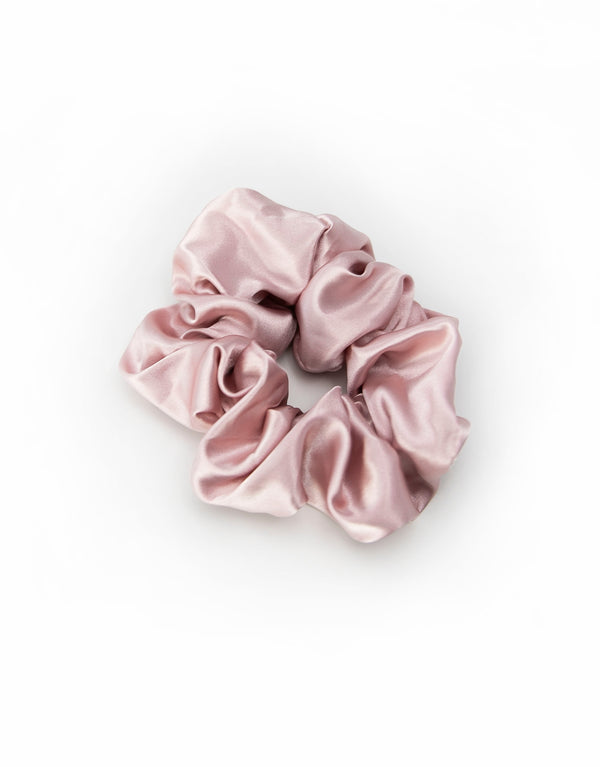 Satin scrunchies in dark blush, soft and silky with a gentle sheen, perfect for adding a touch of elegance to hairstyles.