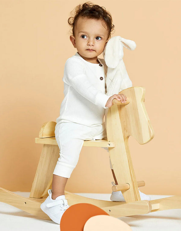 baby wearing 23dreams Knitted Long Sleeve Romper in white