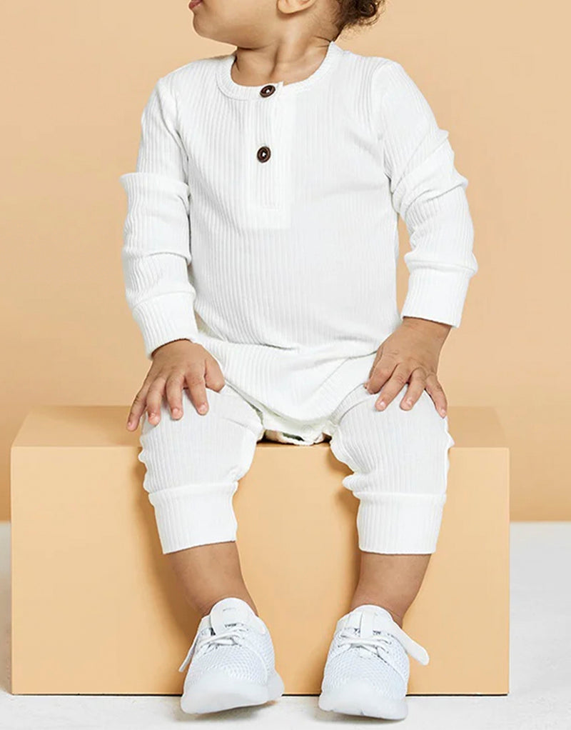 baby wearing 23dreams Knitted Long Sleeve Romper in white
