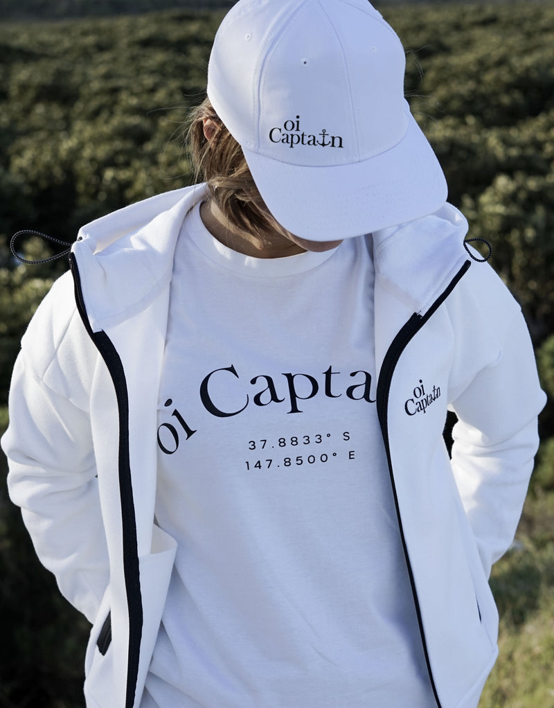 The Seascape Hoodie Jacket is an elevated style weekday to weekend hoodie, designed to take your leisurewear to the next level which is why it's one of our favourites.   Quality vinyl heat pressed Oi Captain logo on chest and back, small detail type latitude and longitude graphic on hood edge.  This high funnel neck and the overall design is crafted to make it unique. Premium cotton, this is a perfect addition for trendsetters' collection and anyone who wants to stand out from the crowd.