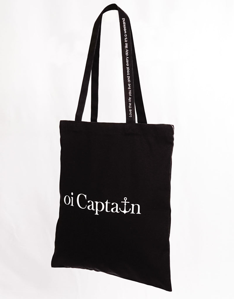 Limited Edition Organic Cotton Canvas Oi Captain Tote Bag is perfect for weekends to everyday.   Quality vinyl heat pressed Oi Captain logo on front and graphic type "Love the life you live and treat everyday like it's a weekend" on handle.  It is your ideal piece to wear any season, durable, sturdy, wonderful and fashionable way to carry things around.