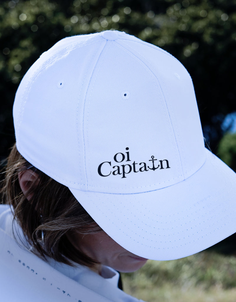 The Oi Captain Endless Summer Cap will quickly become your new favourite for any outdoor activity.  Made with an adjustable band back, structured front panel, and quality made finishes for total comfort. Unisex, one size fits All.  Stay protected in style with this on-trend classic cap.