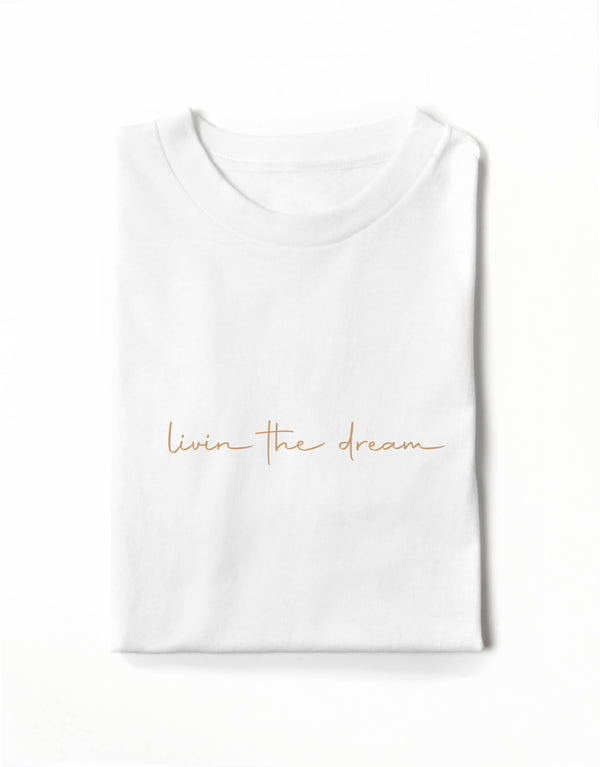 Livin The Dream Tee is available in a range of colours, for him and for her to wear.  Finished with 100% cotton preshrunk jersey knit, set-in rib collar with shoulder-to-shoulder taping, double needle sleeve and bottom hems. Quality vinyl heat pressed printed on front chest.  This is your go-to tee to pair with jeans or to use as a layering piece.